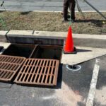 image of storm drains with grates puled out for storm drain stabilization case study