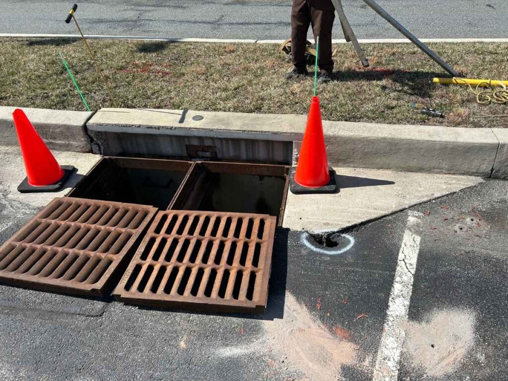 image of storm drains with grates puled out for storm drain stabilization case study